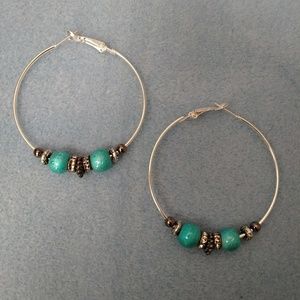 Silver hoop earrings with beads